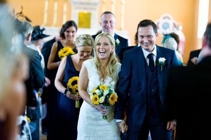 walking down the aisle bride and groom wedding